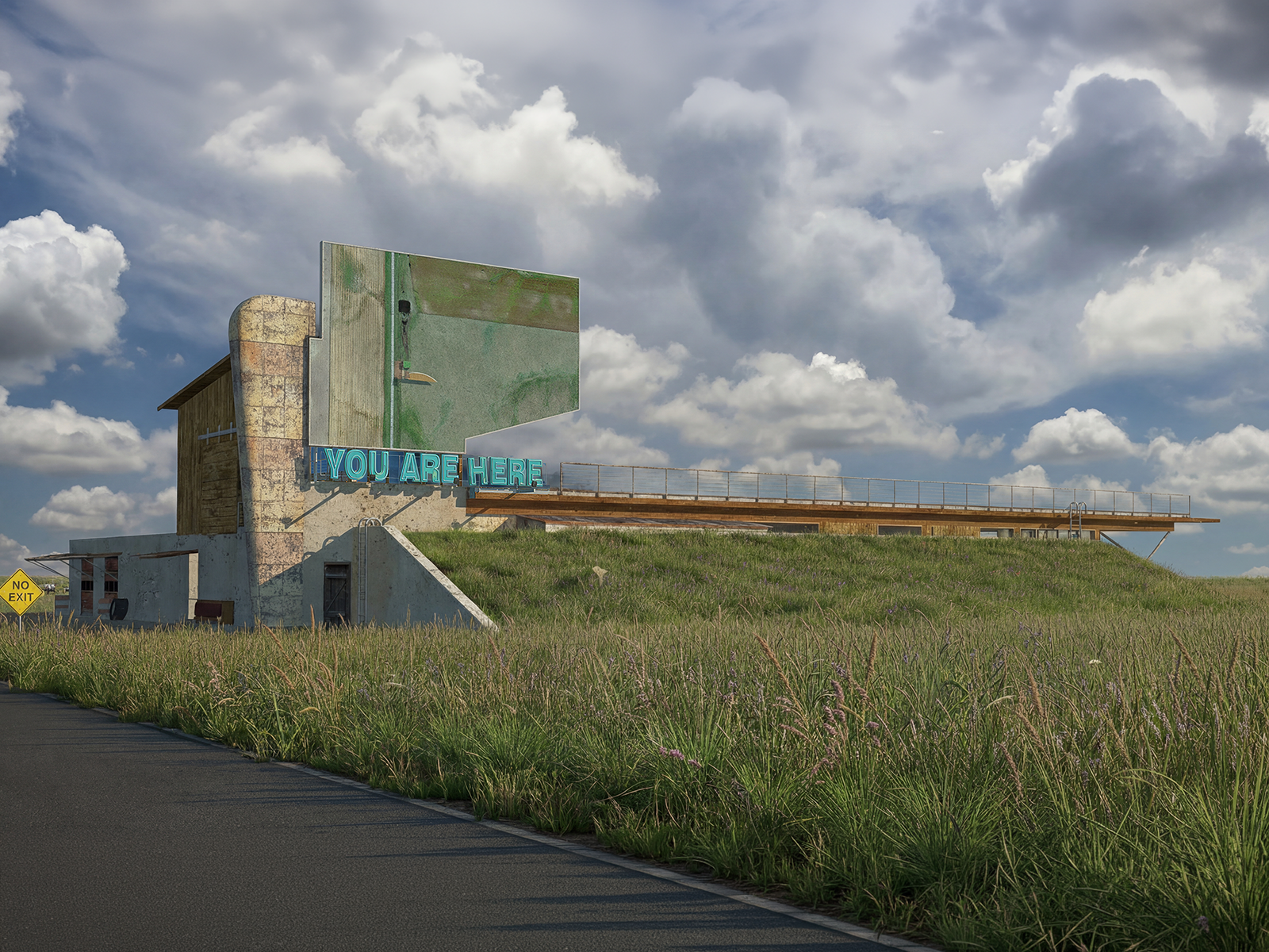 building rising out of a prairie with you are here sign on it
